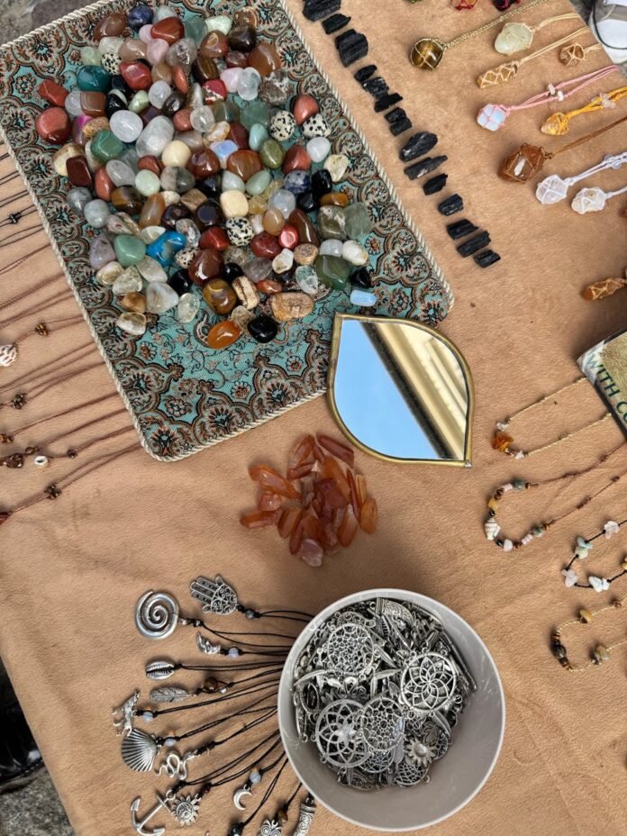 colorful assortment of gemstones and silver jewelry