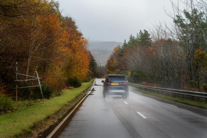 autumn drive on scenic rainy road