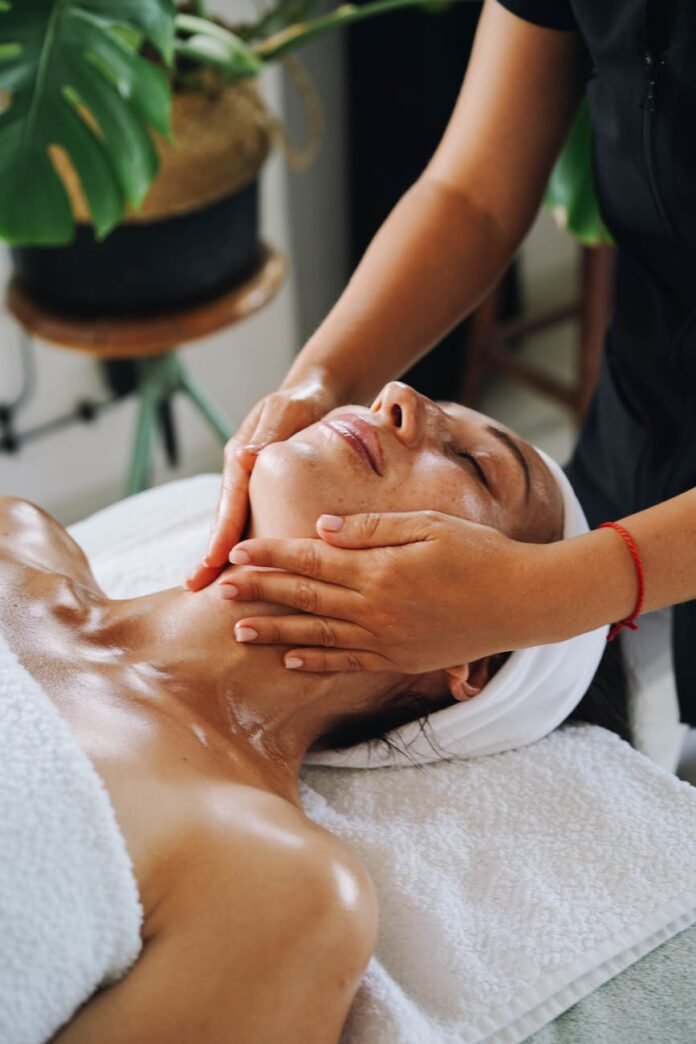 a woman having a face massage