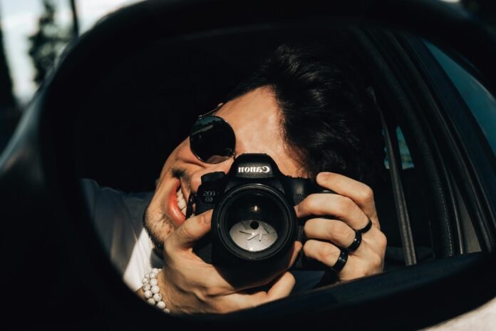 man holding a camera