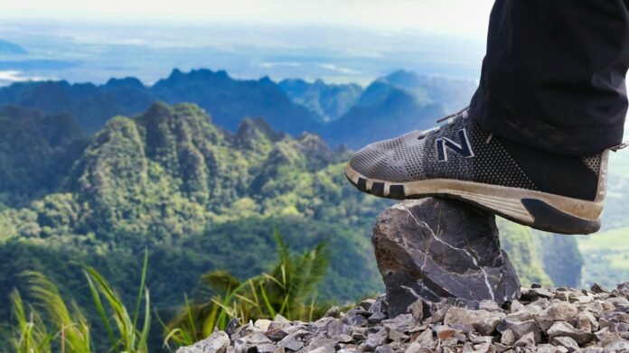 close up photo of person stepping on a rock
