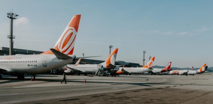 white and orange airliners