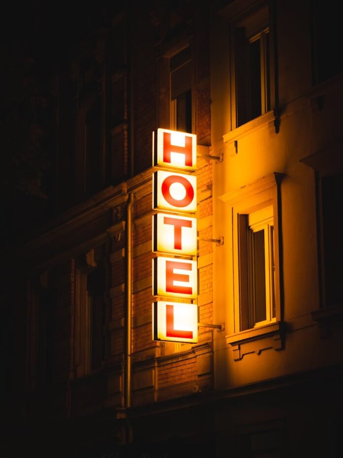 illuminated hotel sign in karlsruhe at night