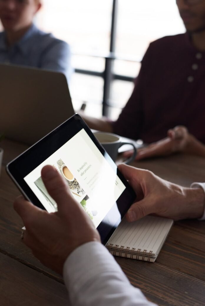 person holding a tablet