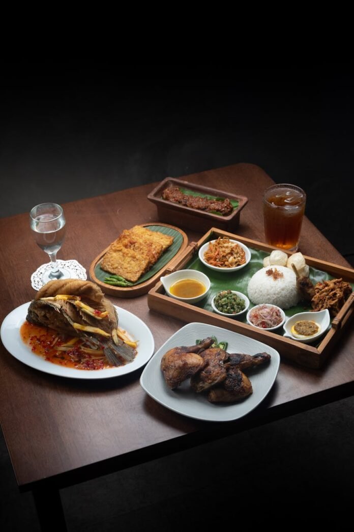 indonesian cuisine on rustic dining table