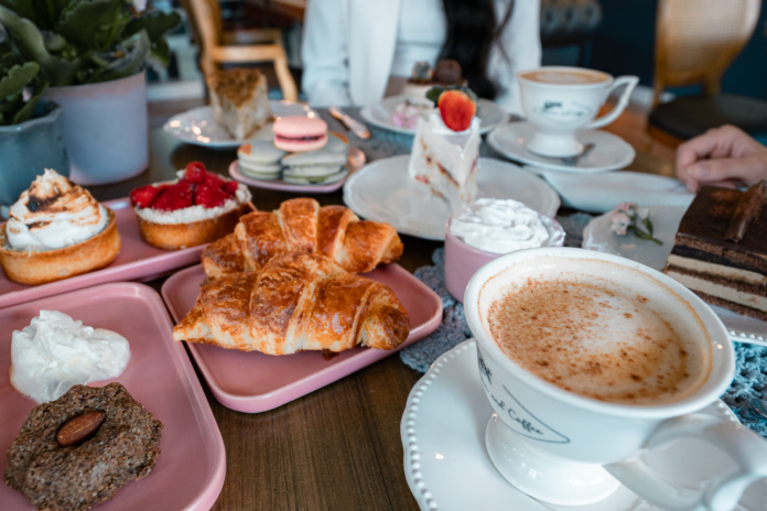 luxurious brunch spread with croissants and desserts