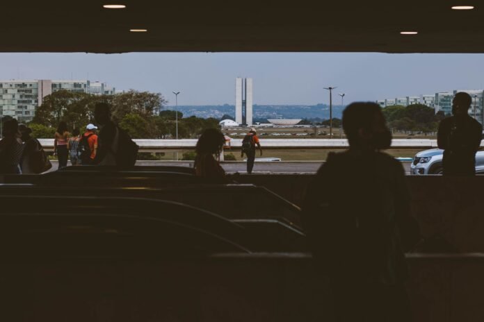 silhouette of busy people on a public place